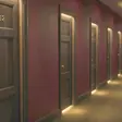 Adult massage near me - a candlelit room and a body oiled for a session