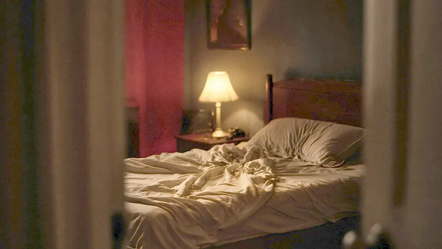 Sexual massage near me - a candlelit room and a body oiled for a session
