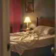 Sexual massage near me - a candlelit room and a body oiled for a session