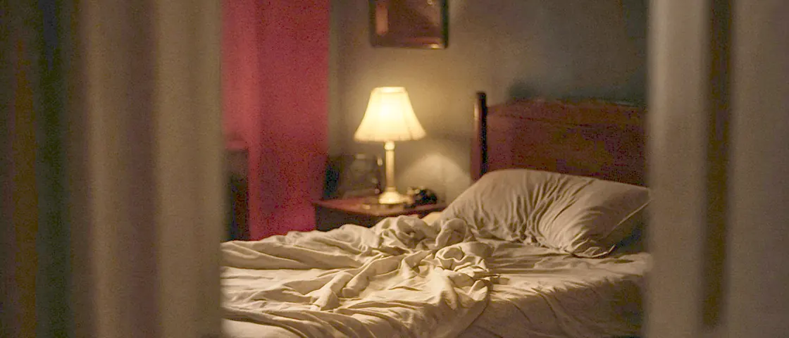 Sexual massage near me - a candlelit room and a body oiled for a session