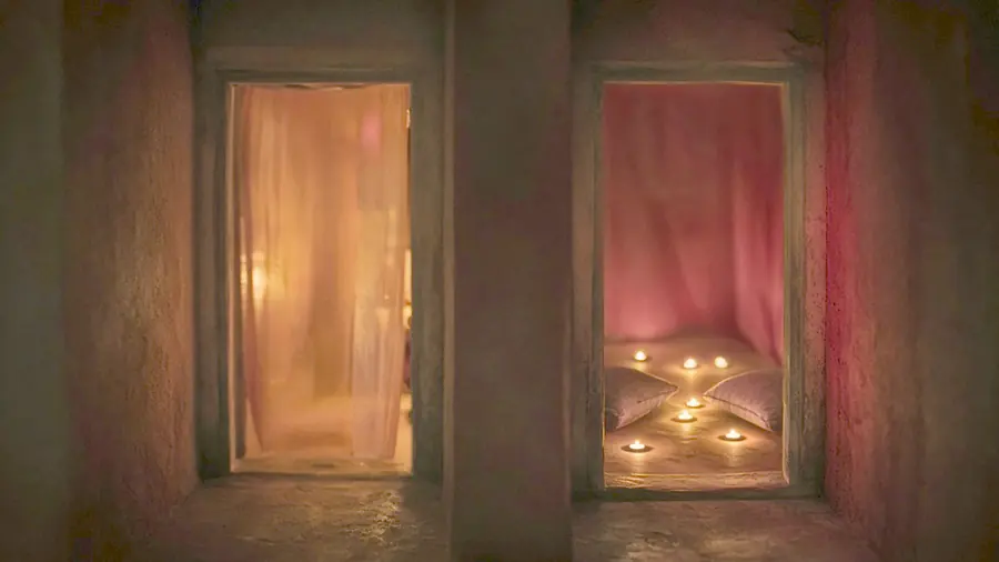 Tantra massage near me - two candlelit rooms to choose between, a figure in one